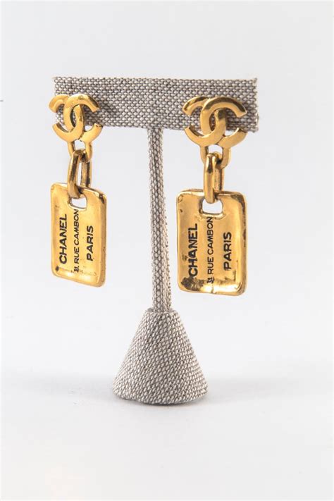 chanel dog tag earrings|chanel pendant earrings.